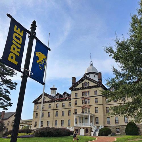 Widener University new Pride flags in front of Old Main historic building